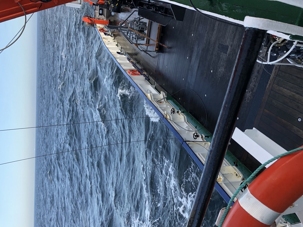 Ship deck and high waves at sea